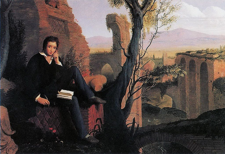 El poeta Percy B. Shelley está sentado en posición pensativa con un libro y una pluma en Roma.